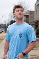 University of Alabama Blue Shirt with a front pocket featuring a ship’s wheel behind a Sailor Big Al design