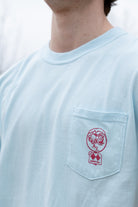 University of Alabama Light Blue T-Shirt with a snow-covered Elephant Seal on the front pocket 
