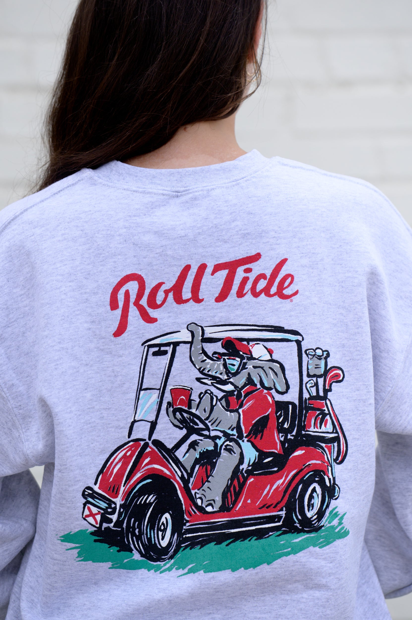 University of Alabama Big Al Golf Cart Grey Gildan Sweatshirt with the text "Roll Tide" above an image of Big Al wearing sunglasses and driving a golf cart