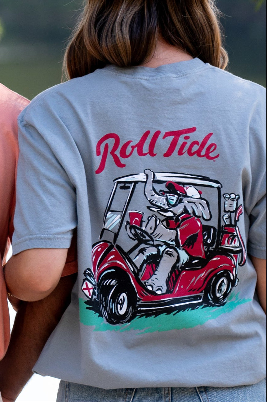 University of Alabama Big Al Golf Cart Grey Comfort Colors -Shirt with the text "Roll Tide" above an image of Big Al wearing sunglasses and driving a golf cart