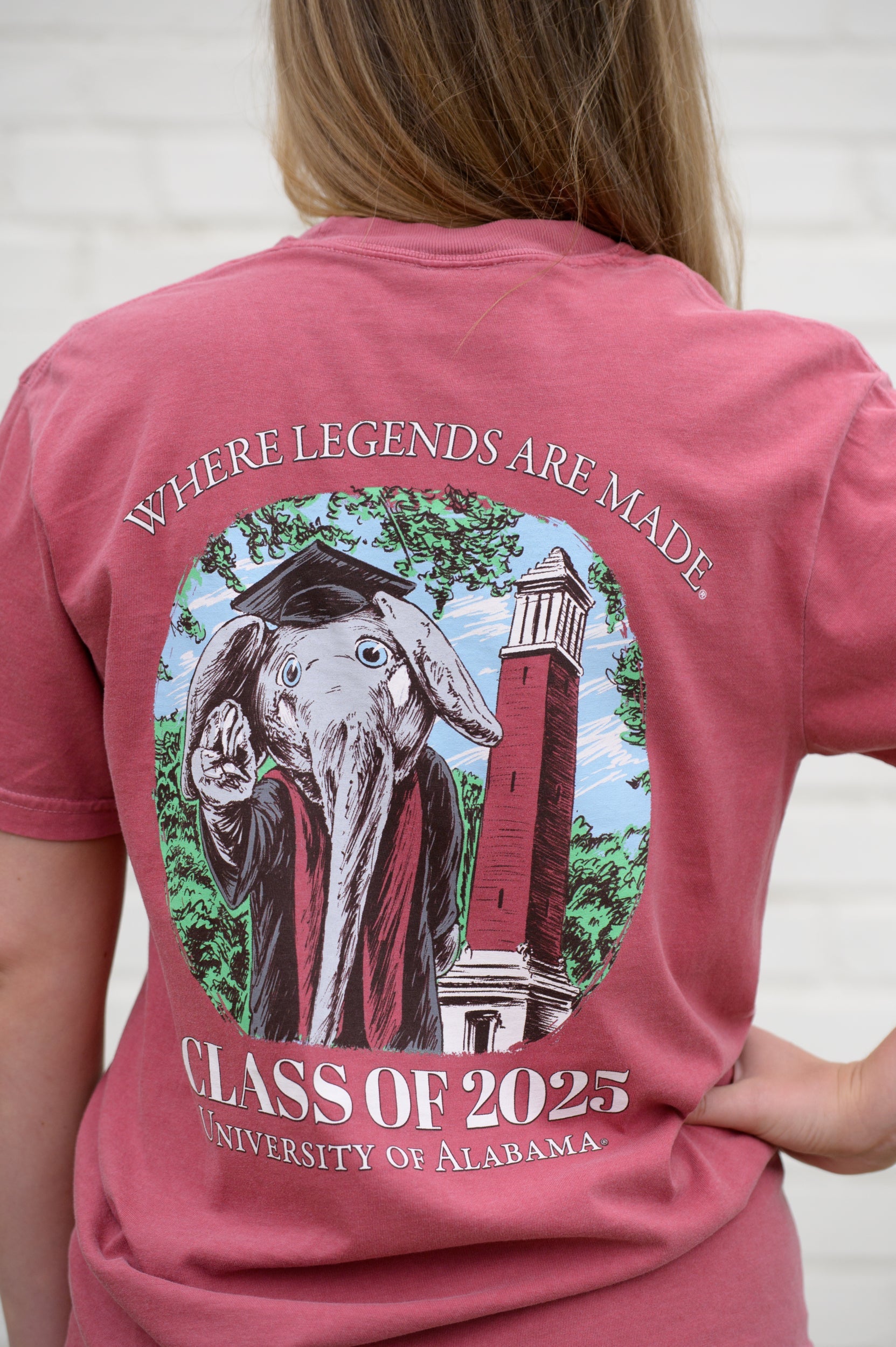 University of Alabama Red Big Al Graduation T-Shirt with an image of Big Al in graduation attire in front of Denny Chimes above White text "Class of 2025"