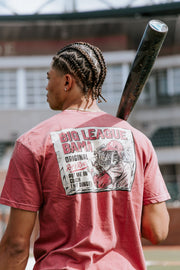 University of Alabama Red Comfort Colors T-Shirt with an image of Big Al in baseball gear swinging a bat below text "Big League Bama"
