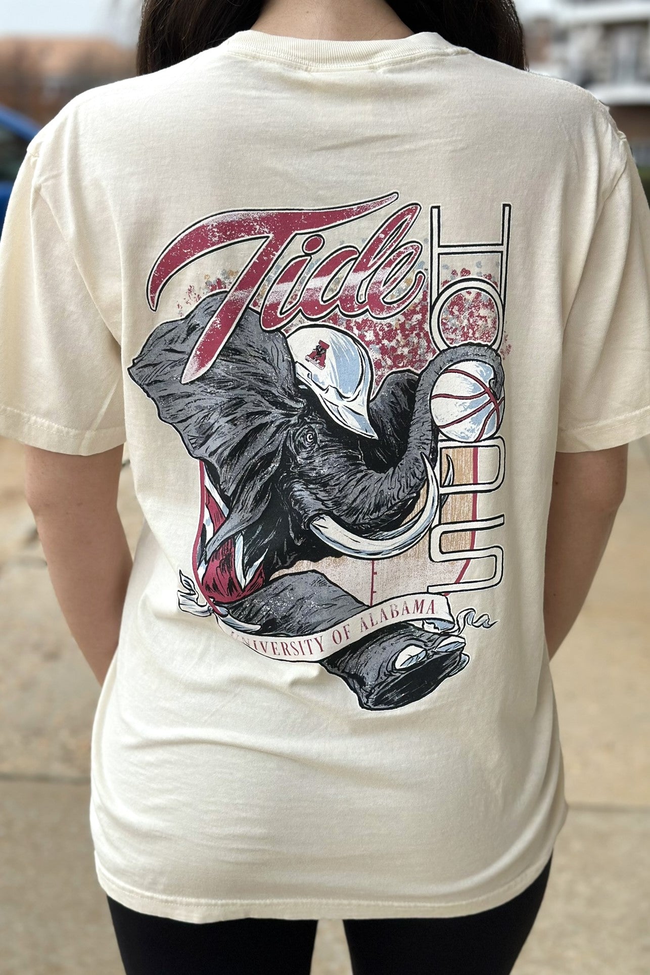 University of Alabama Cream Comfort Colors T-Shirt with an image of Big Al in a hard hat holding a basketball to form the second "O" in "HOOPS 