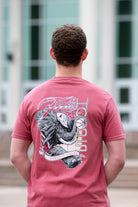 University of Alabama Red T-Shirt with Big Al wearing a hard hat and holding a basketball with his trunk to help spell the word “Hoops”