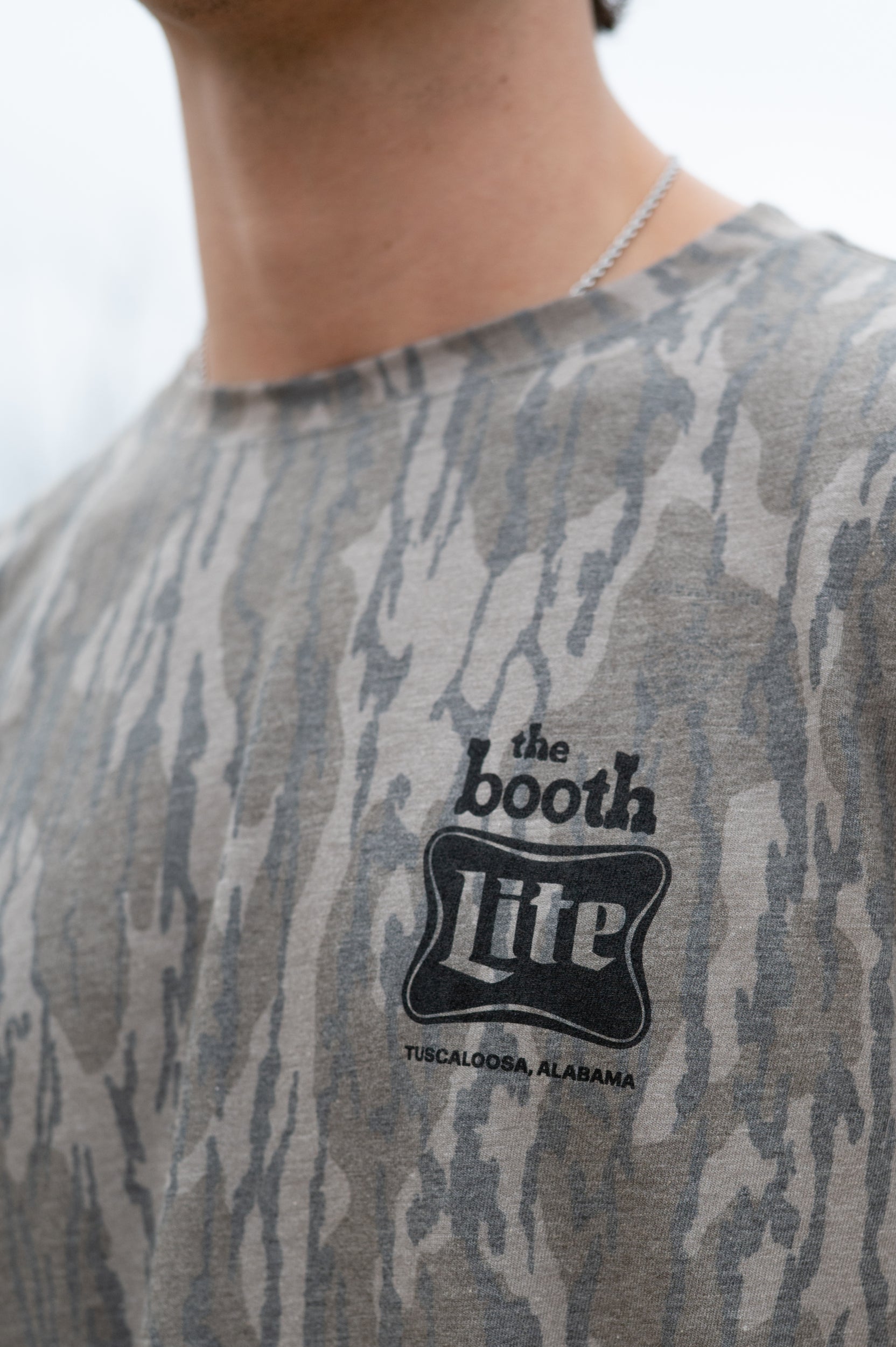 The Booth Camo T-Shirt with Black The Booth Logo on the Chest and the Back