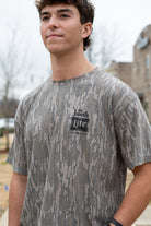 The Booth Camo T-Shirt with Black The Booth Logo on the Chest and the Back