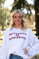 Ole Miss Light Grey Sweatshirt with Red text “University of Mississippi”
