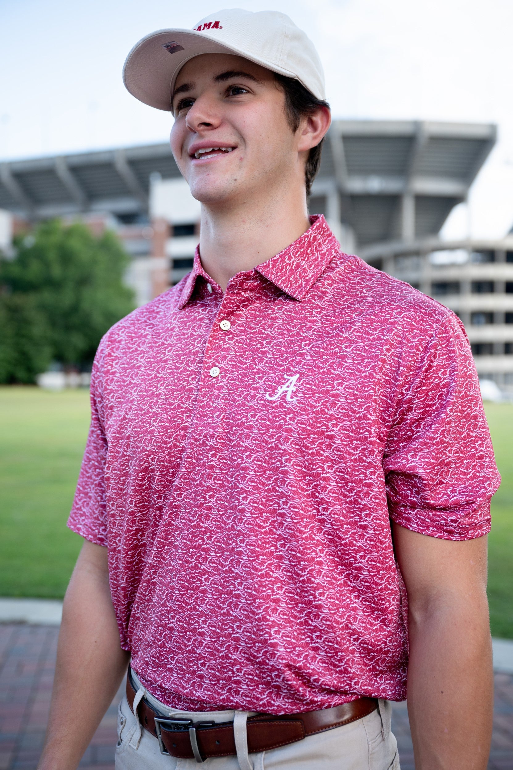 University of Alabama Red Men's Performance Polo with a White wave pattern and White Script A embroidery