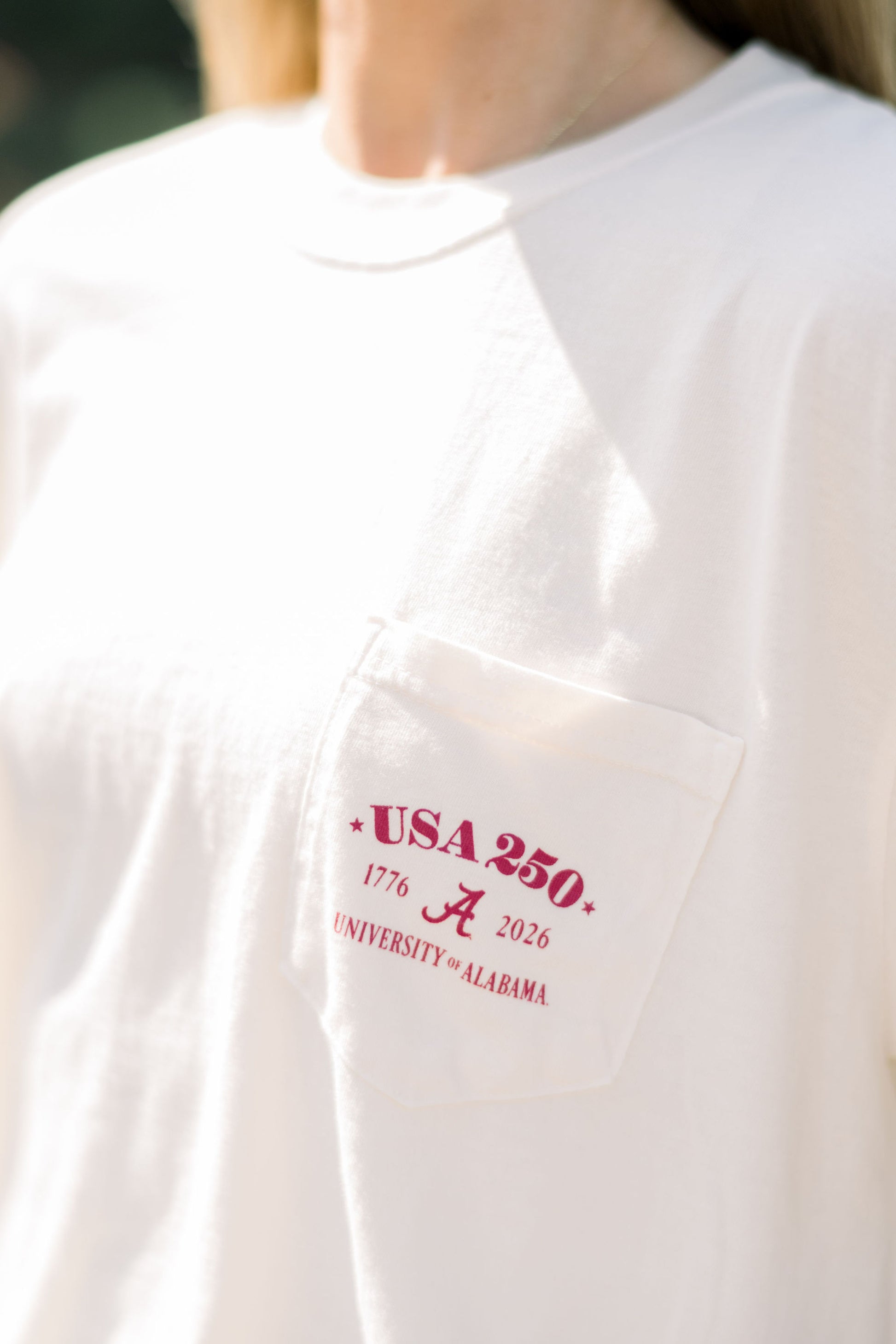 University of Alabama front pocket with Red text “USA 250” above a Script A
