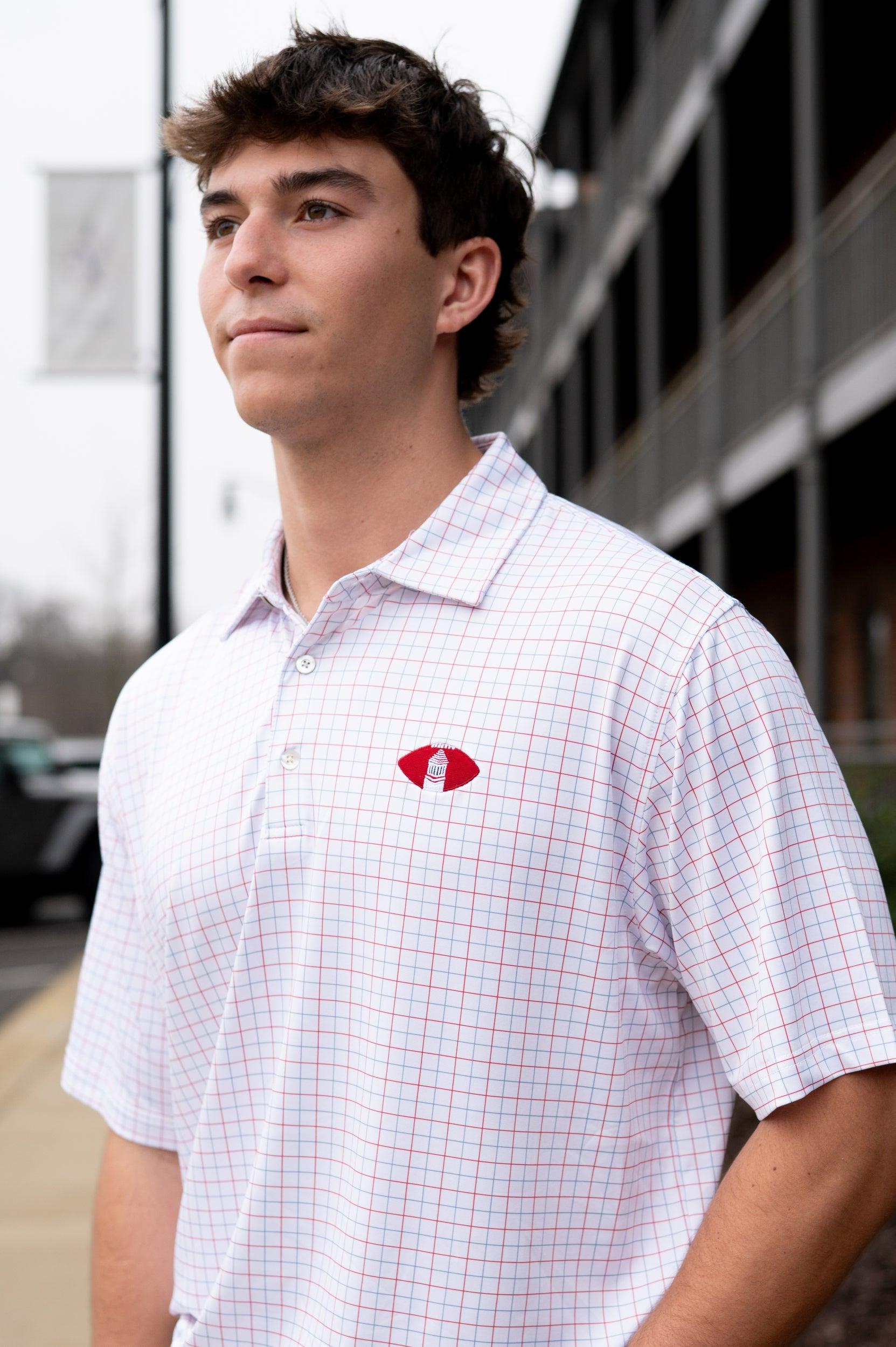 University of Alabama Red/Blue/White patterned Men’s Polo with Denney Chimes in a football embroidered on the chest 