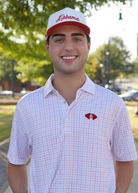 University of Alabama Red/Blue/White patterned Men’s Polo with Denney Chimes in a football embroidered on the chest 