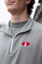 University of Alabama Grey Striped Men’s ¼ Zip Pullover with Denney Chimes in a football embroidered on the chest 