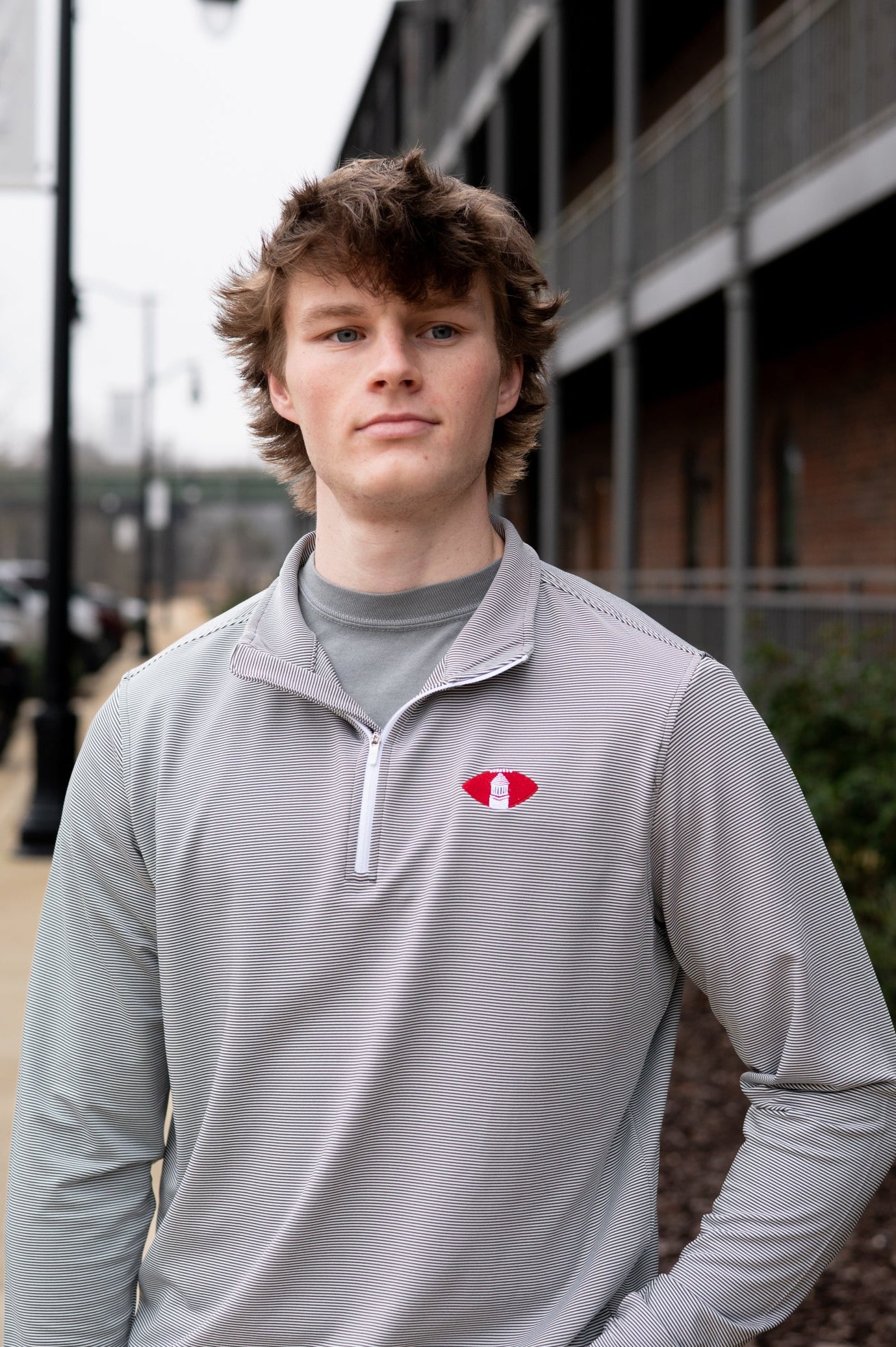 University of Alabama Grey Striped Men’s ¼ Zip Pullover with Denney Chimes in a football embroidered on the chest 