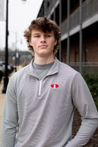 University of Alabama Grey Striped Men’s ¼ Zip Pullover with Denney Chimes in a football embroidered on the chest 
