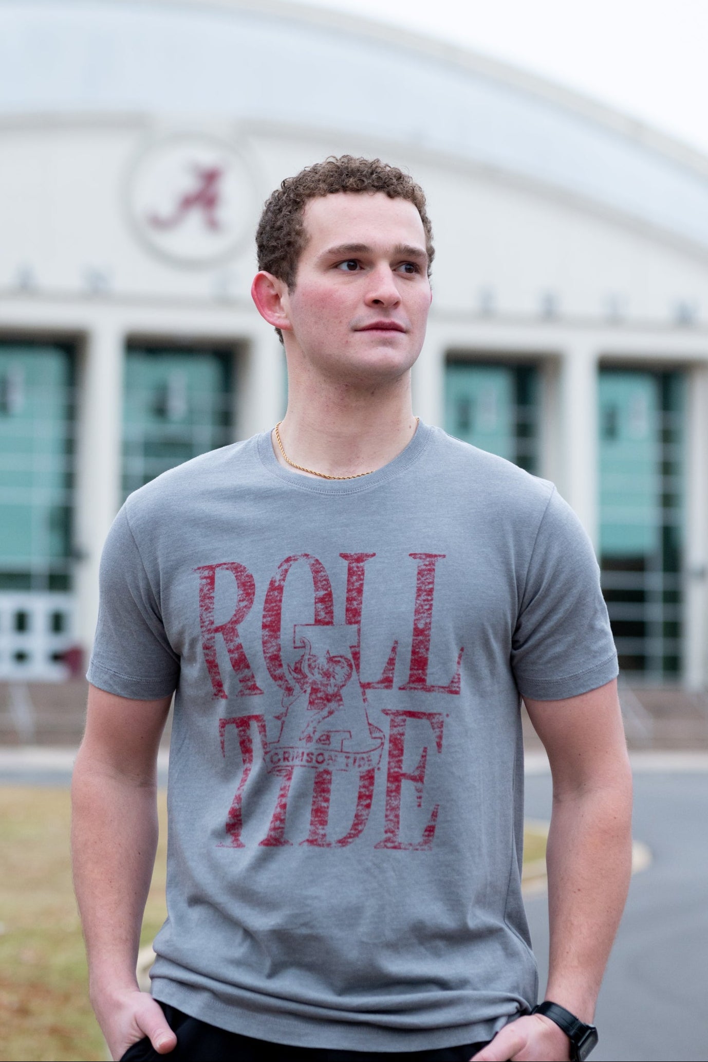 University of Alabama Grey T-Shirt with a distressed print of the Vintage A logo in front of Red text “Roll Tide”