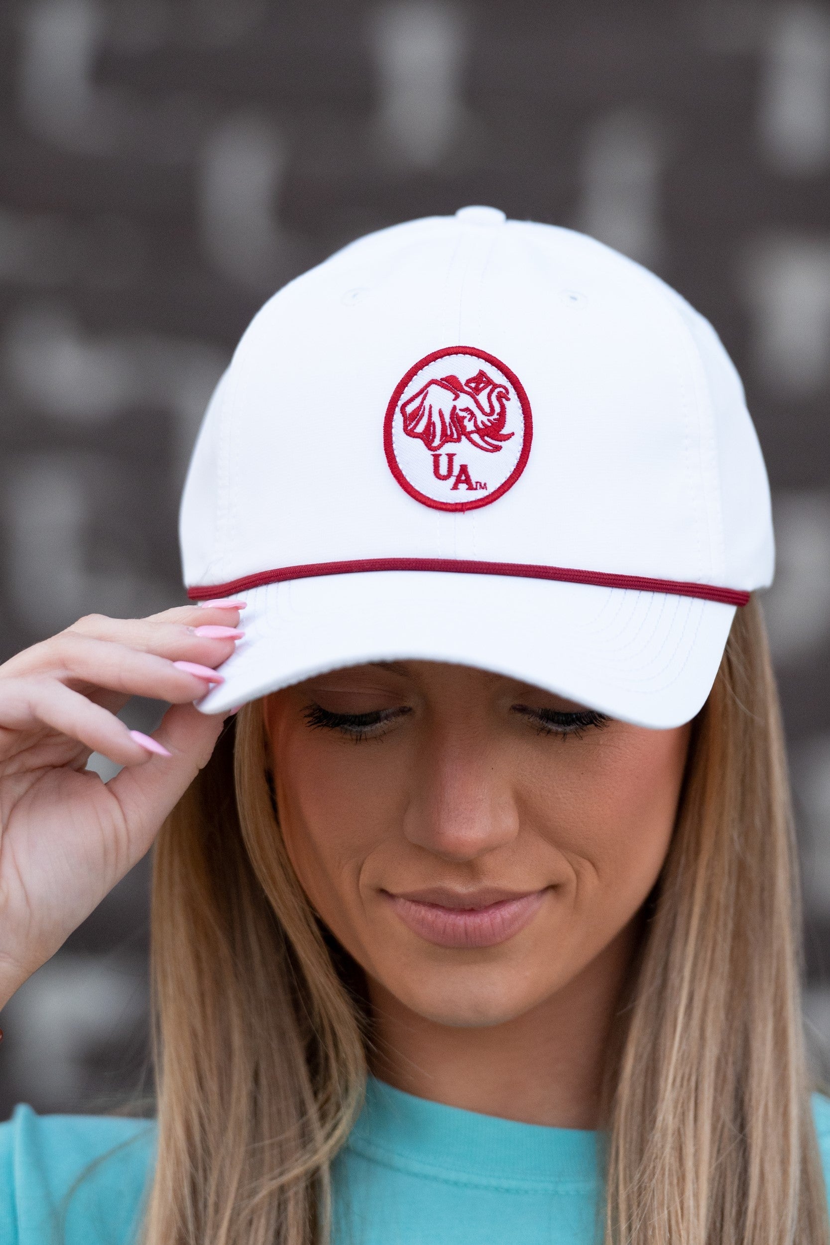 University of Alabama White Rope Hat with a Red Rope and an image of an elephant holding an Alabama State flag above the letters "UA"