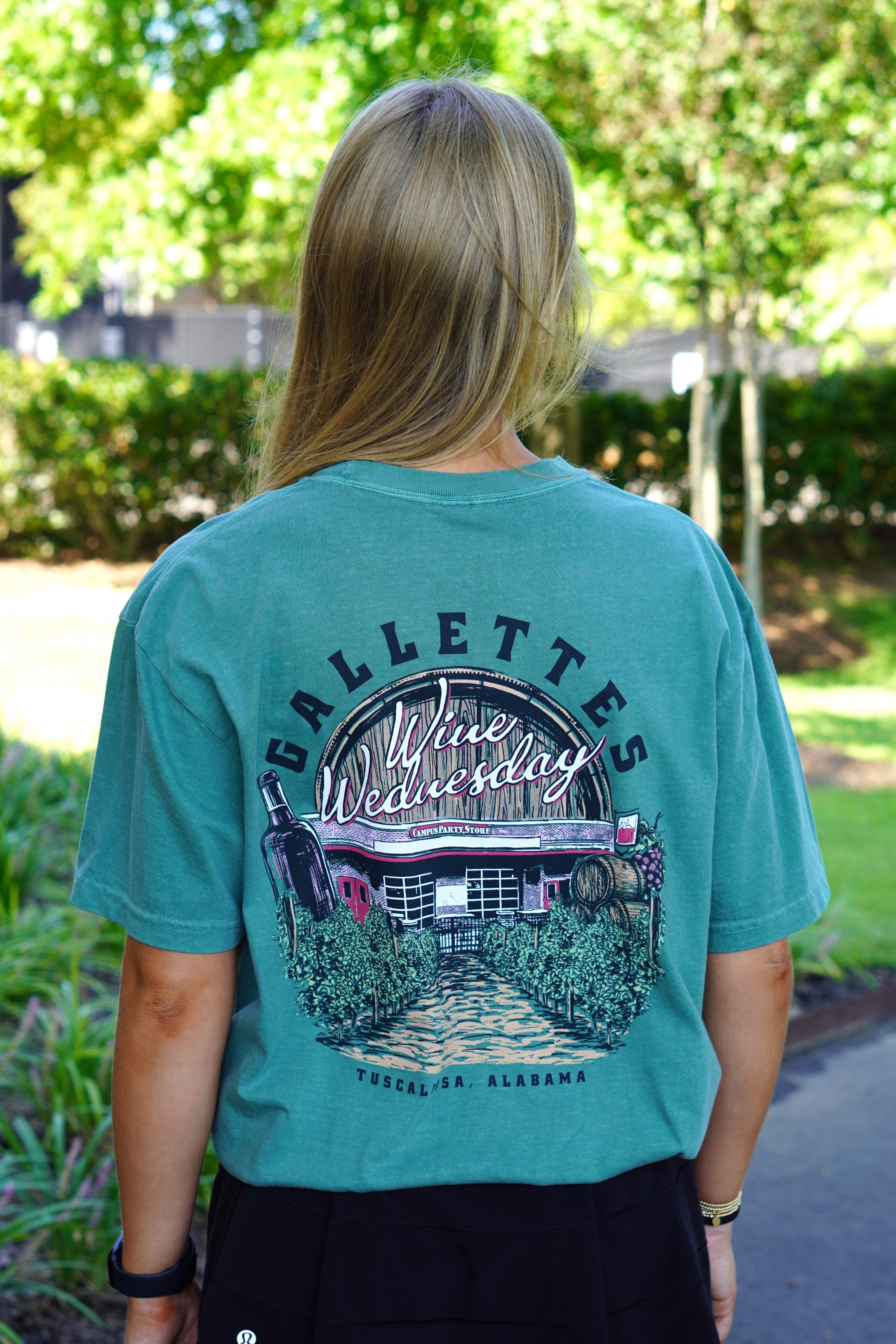 Gallettes Green Wine Wednesday T-Shirt with an image of the Gallettes Building in a vineyard in front of a wine barrel with White text "Wine Wednesday  