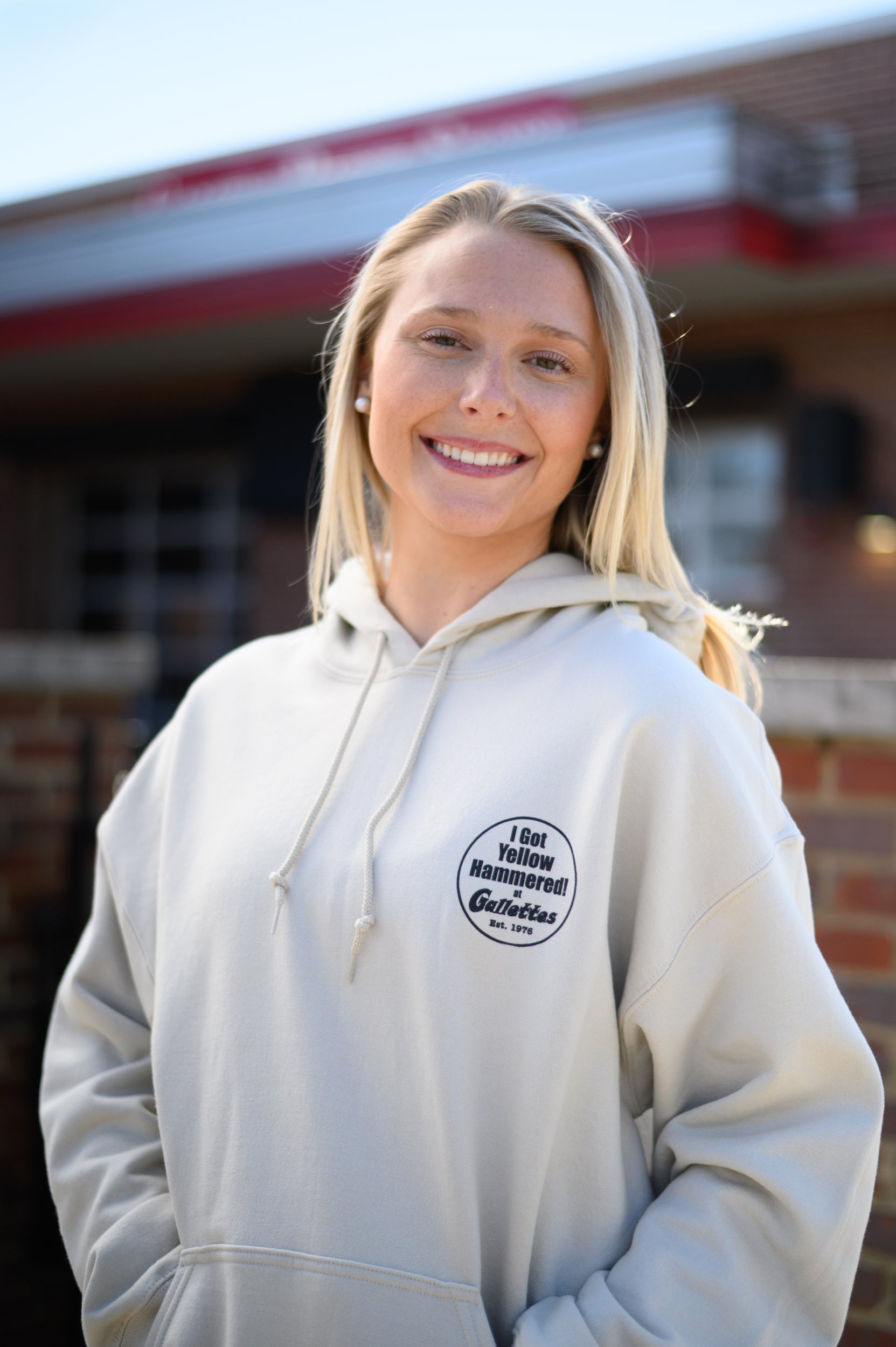 Gallettes Tan Hoodie with an “I Got Yellow Hammered at Gallettes” left chest design