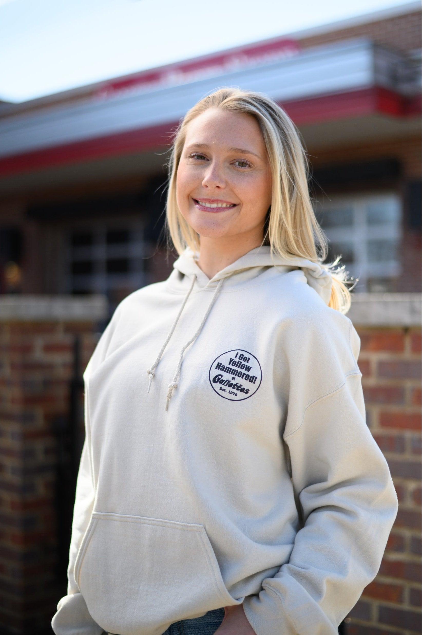 Gallettes Tan Hoodie with an “I Got Yellow Hammered at Gallettes” left chest design