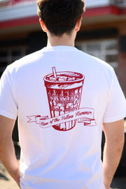 Gallettes White T-Shirt with a Red illustration of a full Gallettes cup behind a banner with text "Home of the Yellow Hammer"