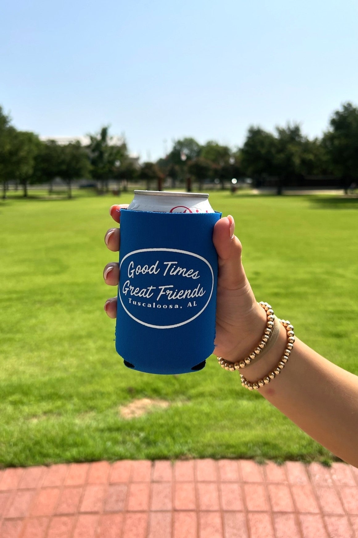 Good Times Tuscaloosa Blue Koozie with White text "Good Times Great Friends" 
