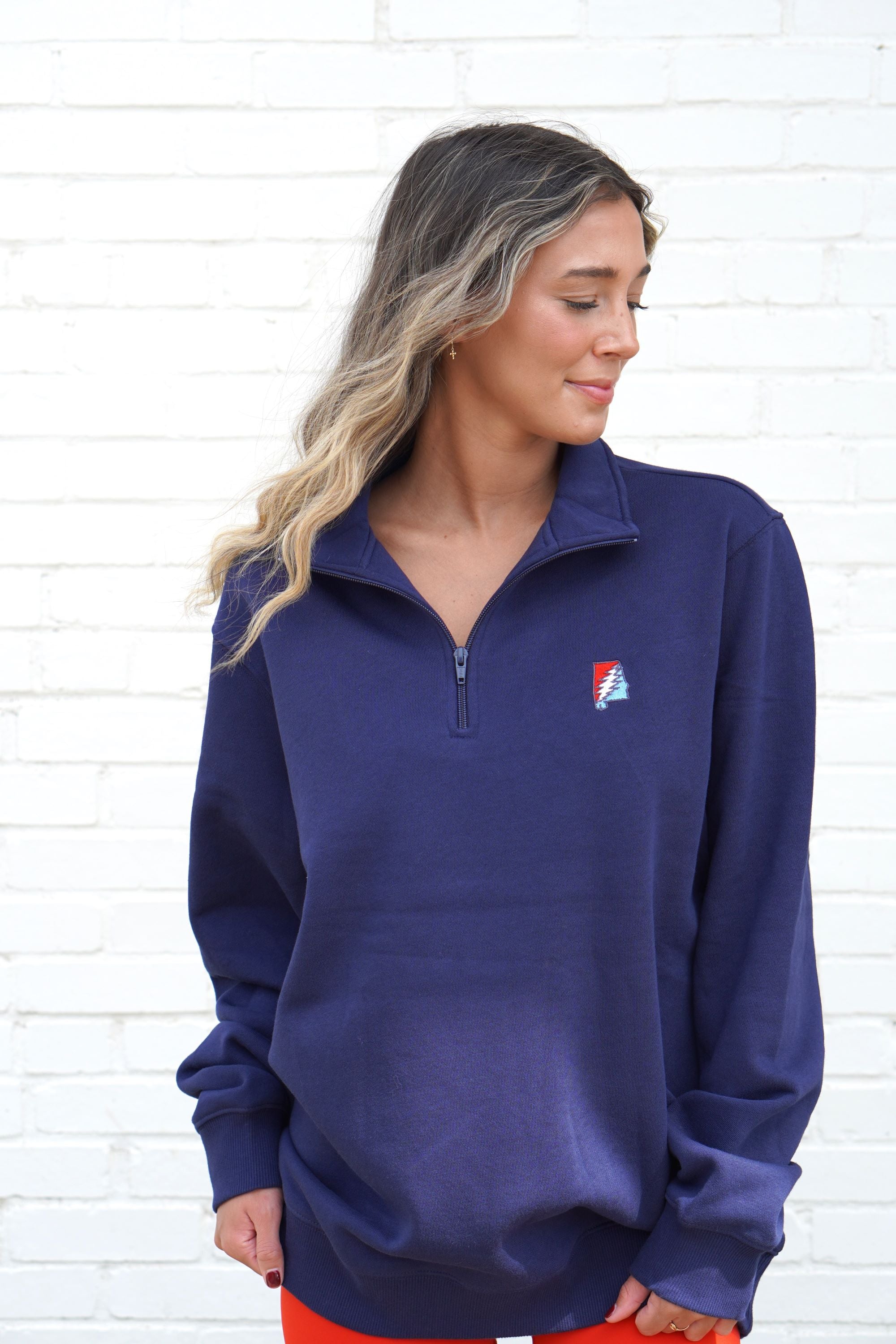 Grateful State Navy Sport Tek ¼ Zip with a Red and Blue embroidery of the Alabama "Grateful State" Logo