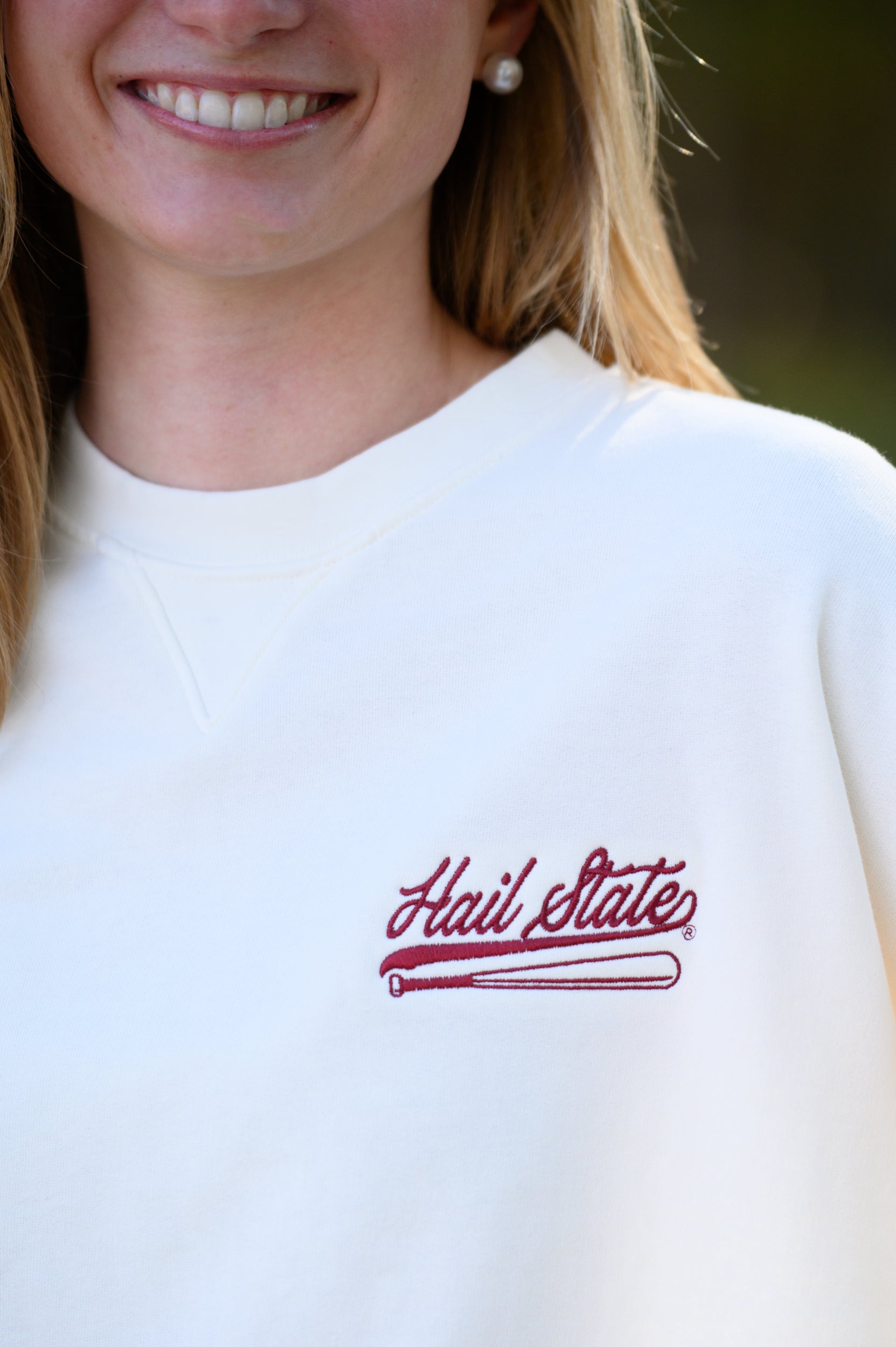 Mississippi State Cream Sweatshirt with Maroon “Hail State” script and baseball bat embroidery