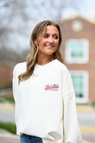 Mississippi State Cream Sweatshirt with Maroon “Hail State” script and baseball bat embroidery