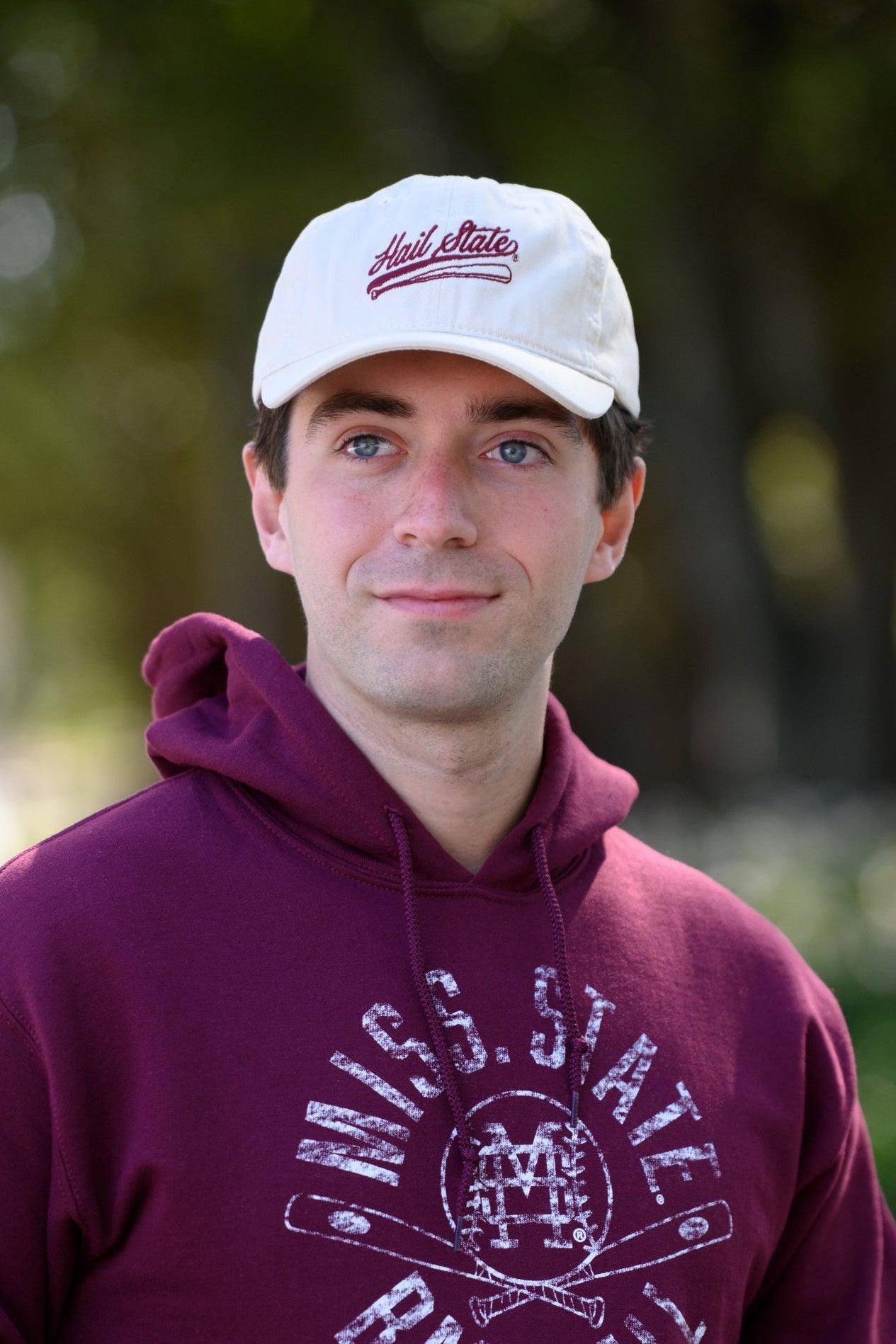 Mississippi State Light Tan Dad Hat with Maroon “Hail State” script and baseball bat embroidery