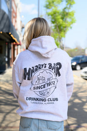 Harry’s Bar Grey Hoodie with an image of an overflowing beer mug with a sash reading “Since 1972” above the text “Drinking Club”