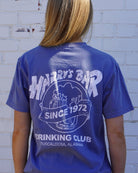 Harry’s Bar Blue T-Shirt with an image of an overflowing beer mug with a sash reading “Since 1972” above the text “Drinking Club”