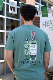 Innisfree Green T-Shirt with a hand-drawn design featuring a leprechaun leaning against a bottle and the text 'INNISFREE Irish Pub' on the back.