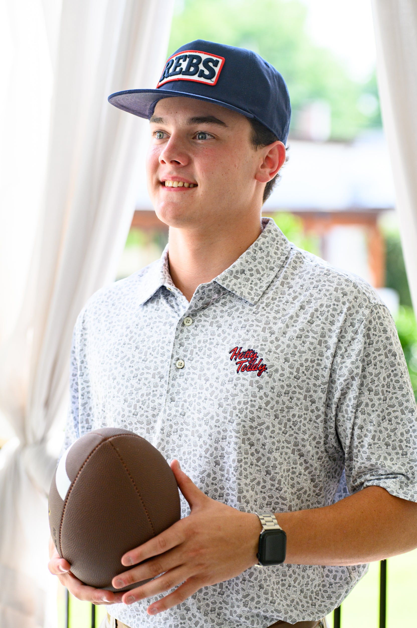 Ole Miss Grey Men’s Patterned Polo with a tailgate themed pattern and Red script “Hotty Toddy” embroidery