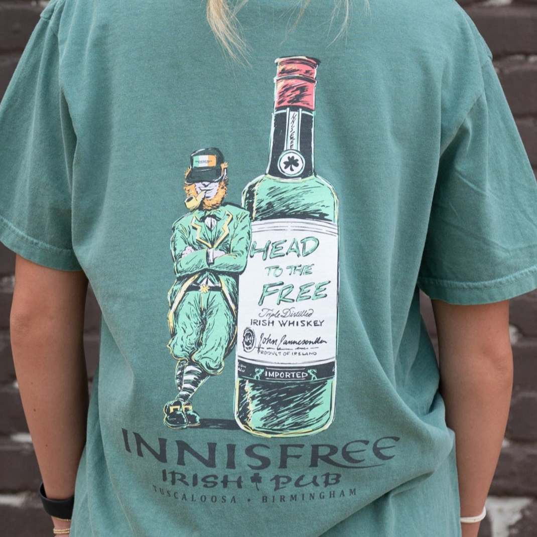 Innisfree Green T-Shirt with a hand-drawn design featuring a leprechaun leaning against a bottle and the text 'INNISFREE Irish Pub' on the back.