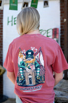 Innisfree Red Lucky Leprechaun T-Shirt with an image of a leprechaun sitting on top of the Innisfree Building