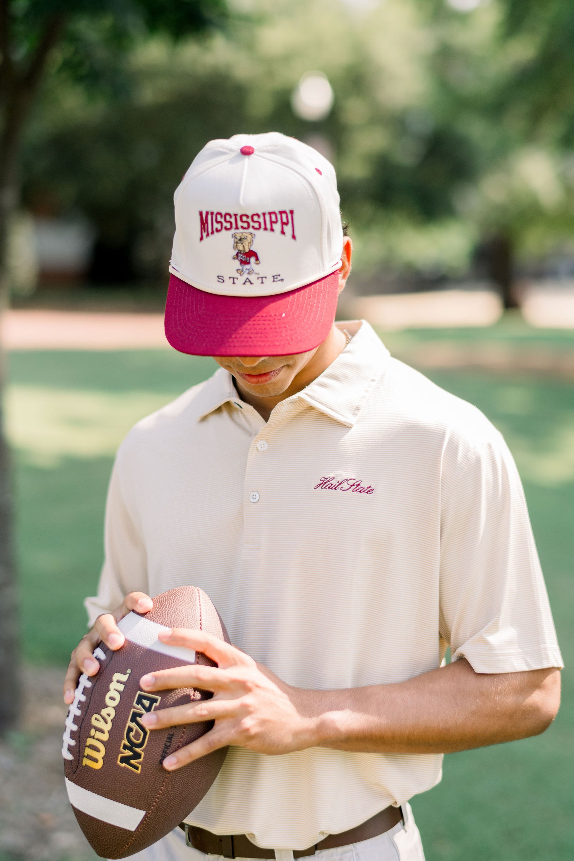Mississippi State Cream and Maroon Hat with the Walking Bully Logo in between embroidered text “Mississippi State” 