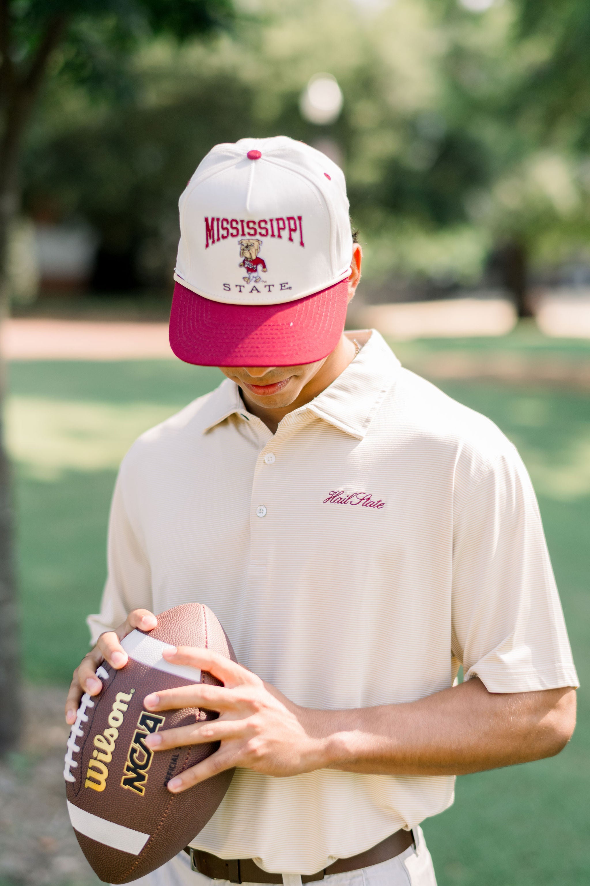 Mississippi State Cream and Maroon Hat with the Walking Bully Logo in between embroidered text “Mississippi State” 