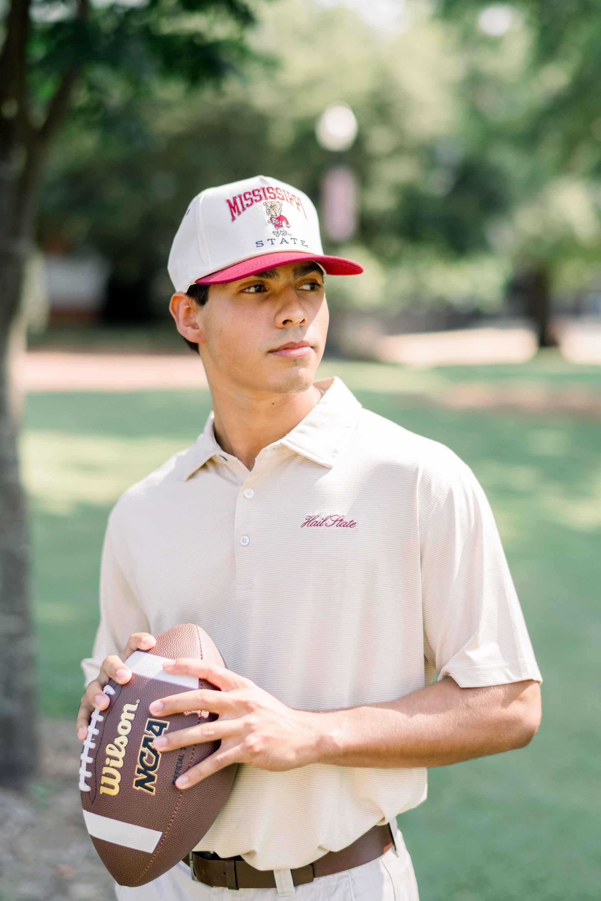 Mississippi State Cream and Maroon Hat with the Walking Bully Logo in between embroidered text “Mississippi State” 