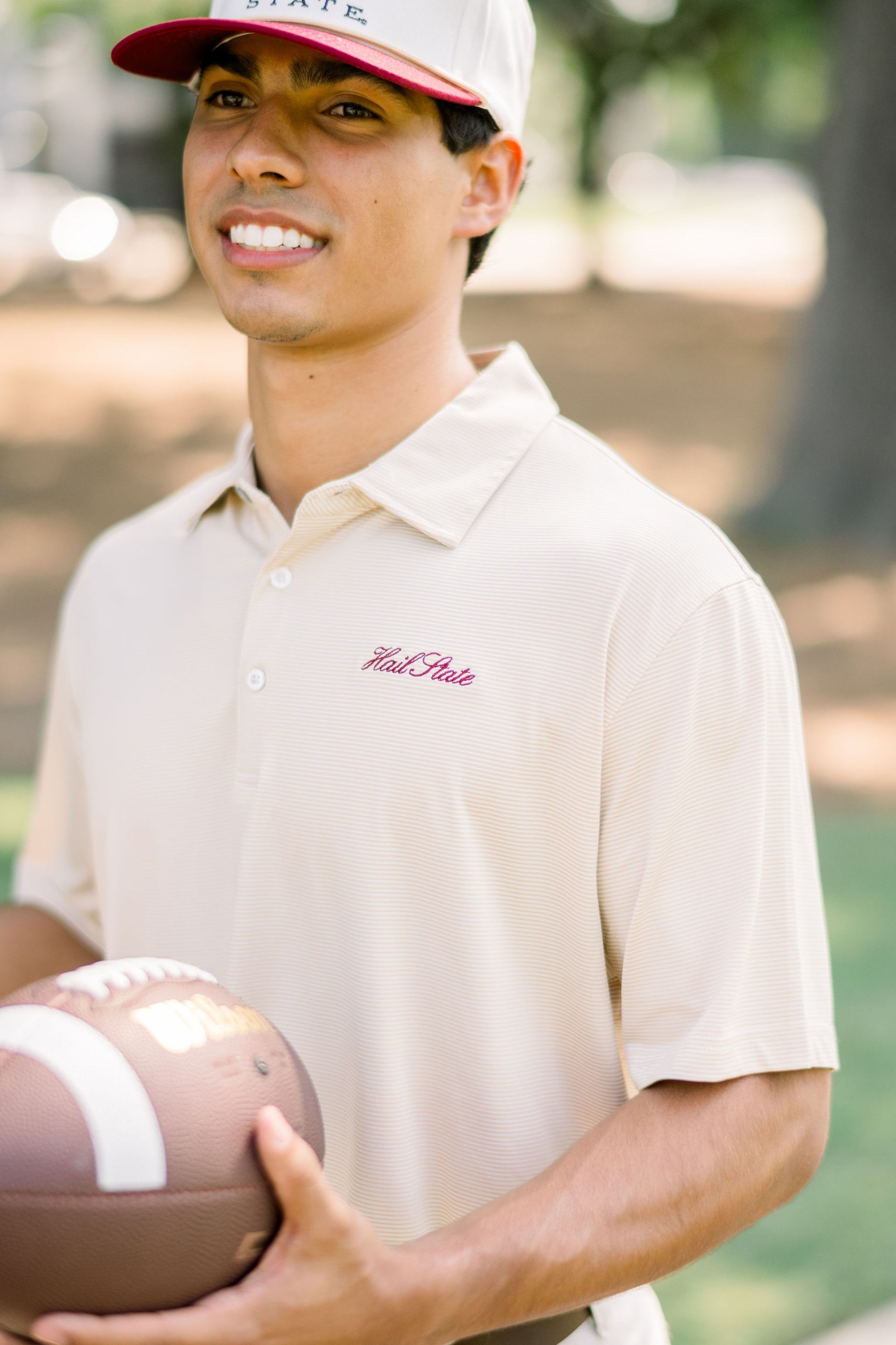 Mississippi State Men’s Tan Stripe Polo with Maroon Script “Hail State” Embroidered on the Chest