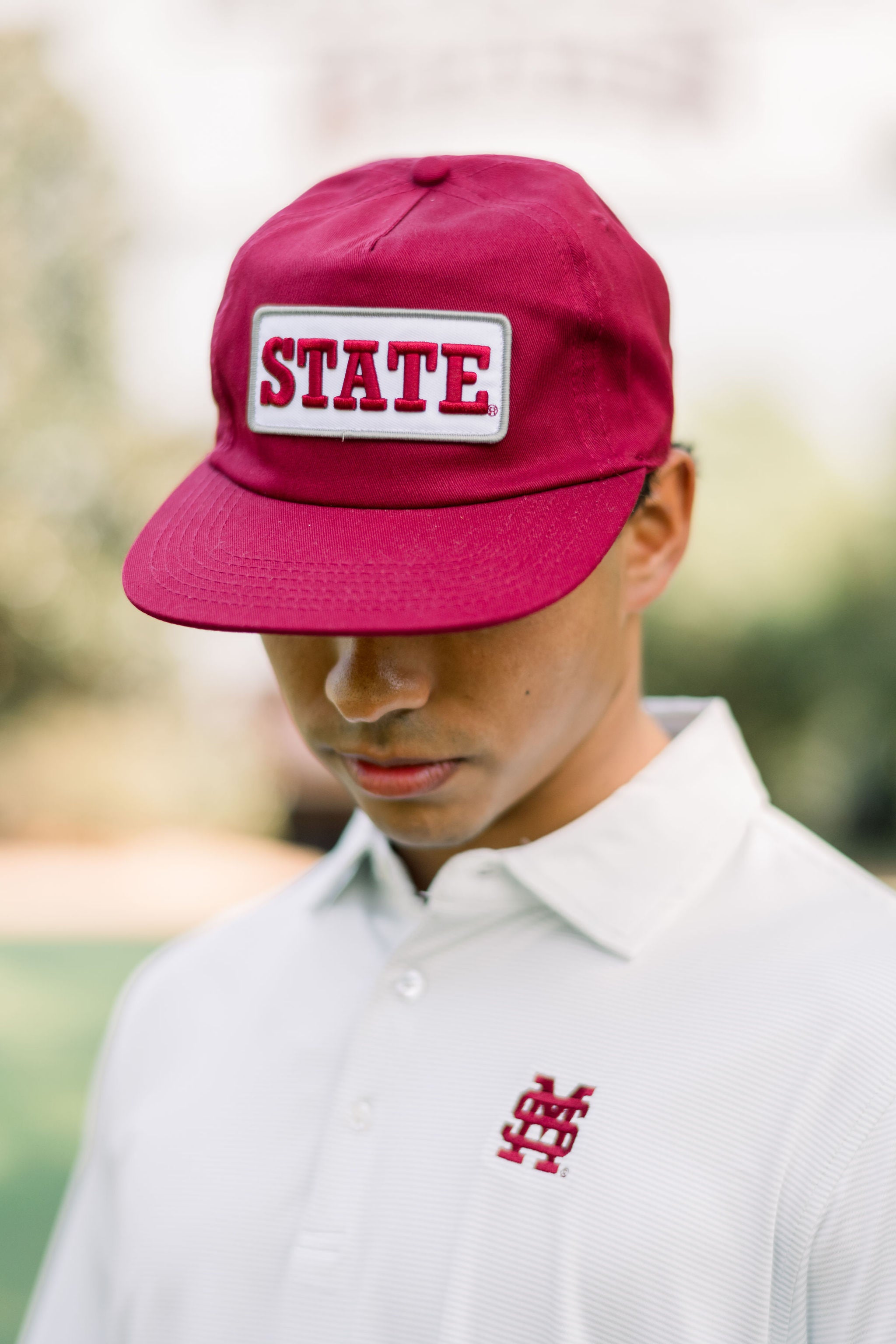 Mississippi State Maroon Snapback Hat featuring a White patch with Maroon “State” embroidery