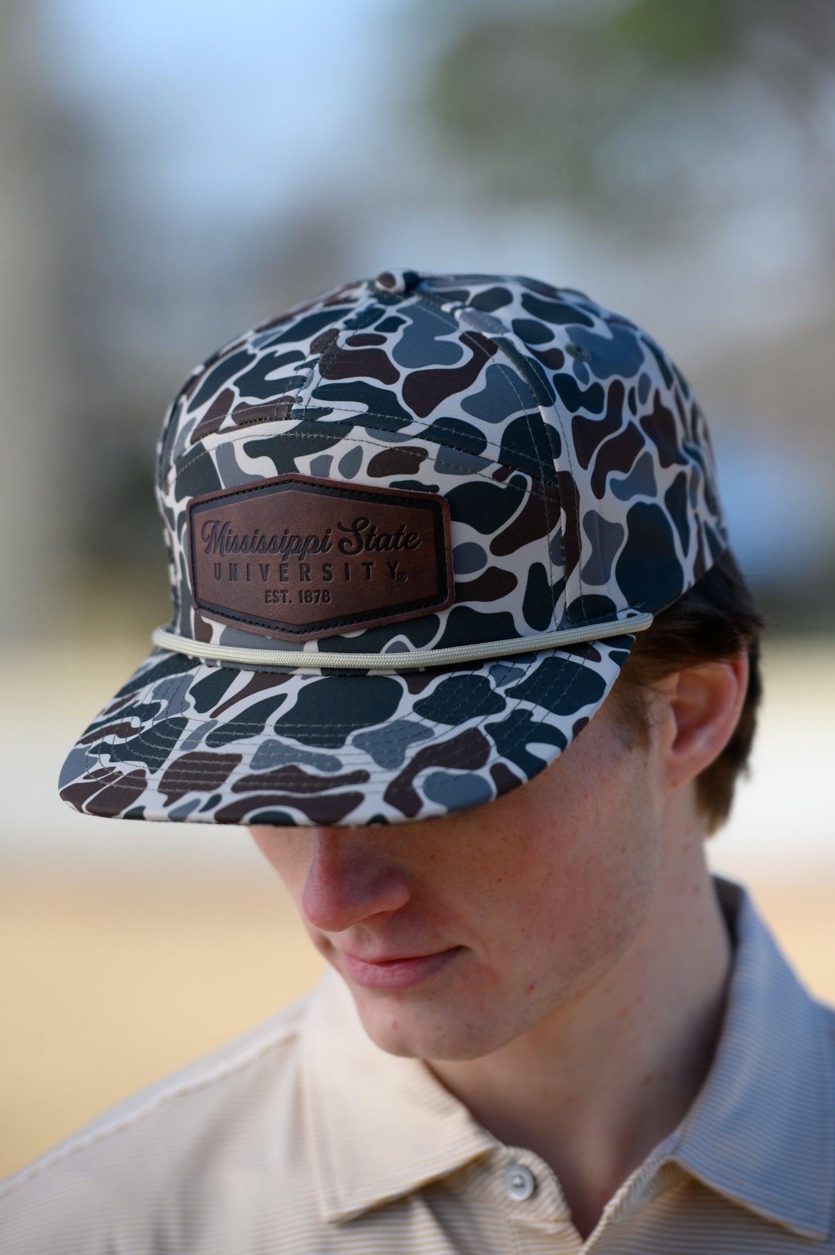Mississippi State Camo Hat with a White rope and a leather patch with text “Mississippi State University”
