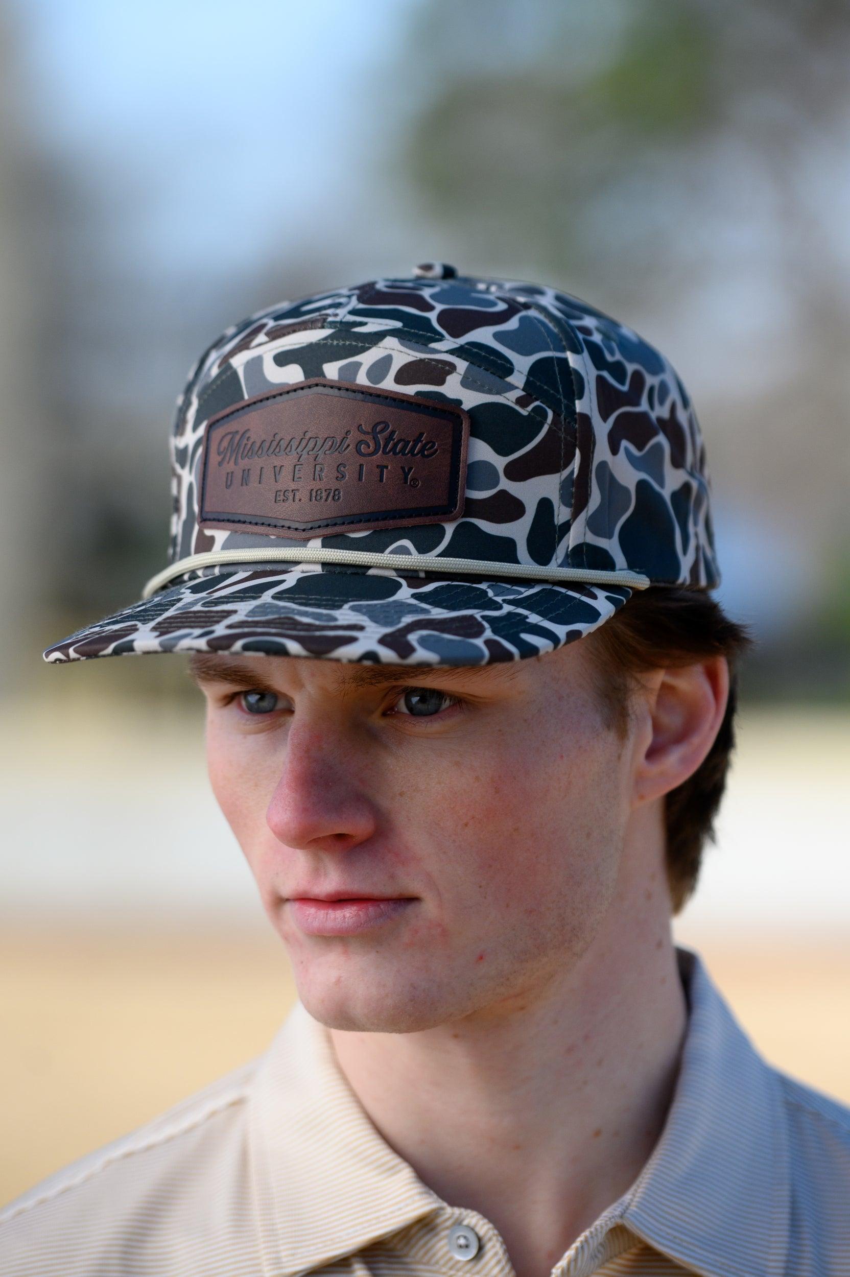 Mississippi State Camo Hat with a White rope and a leather patch with text “Mississippi State University”