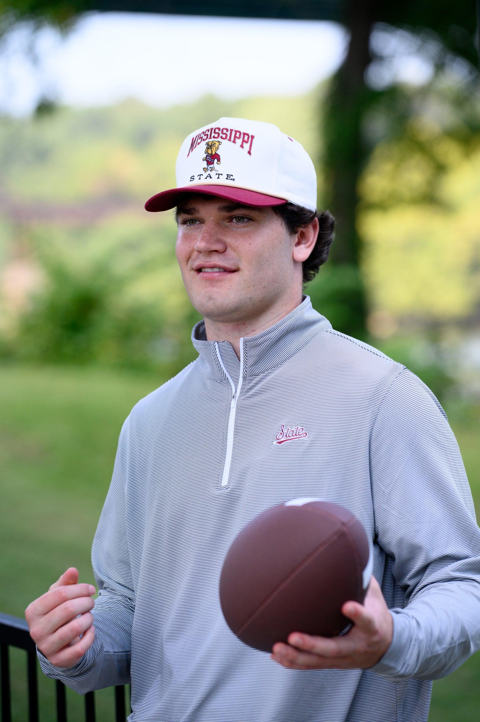 Mississippi State Cream and Maroon Hat with the Walking Bully Logo in between embroidered text “Mississippi State” 