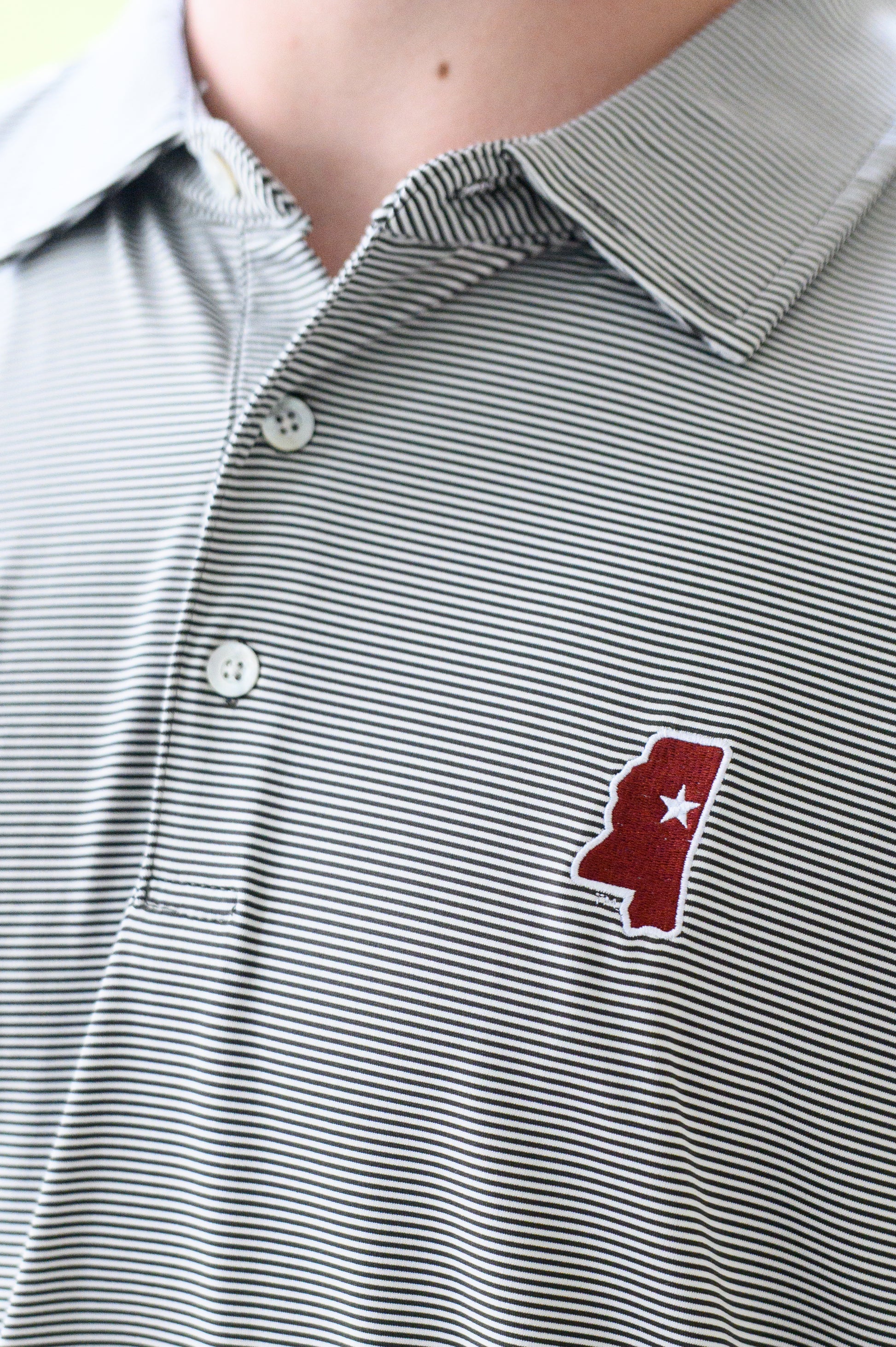 Mississippi State Grey Men’s Stripe Polo with the Mississippi State outline embroidery