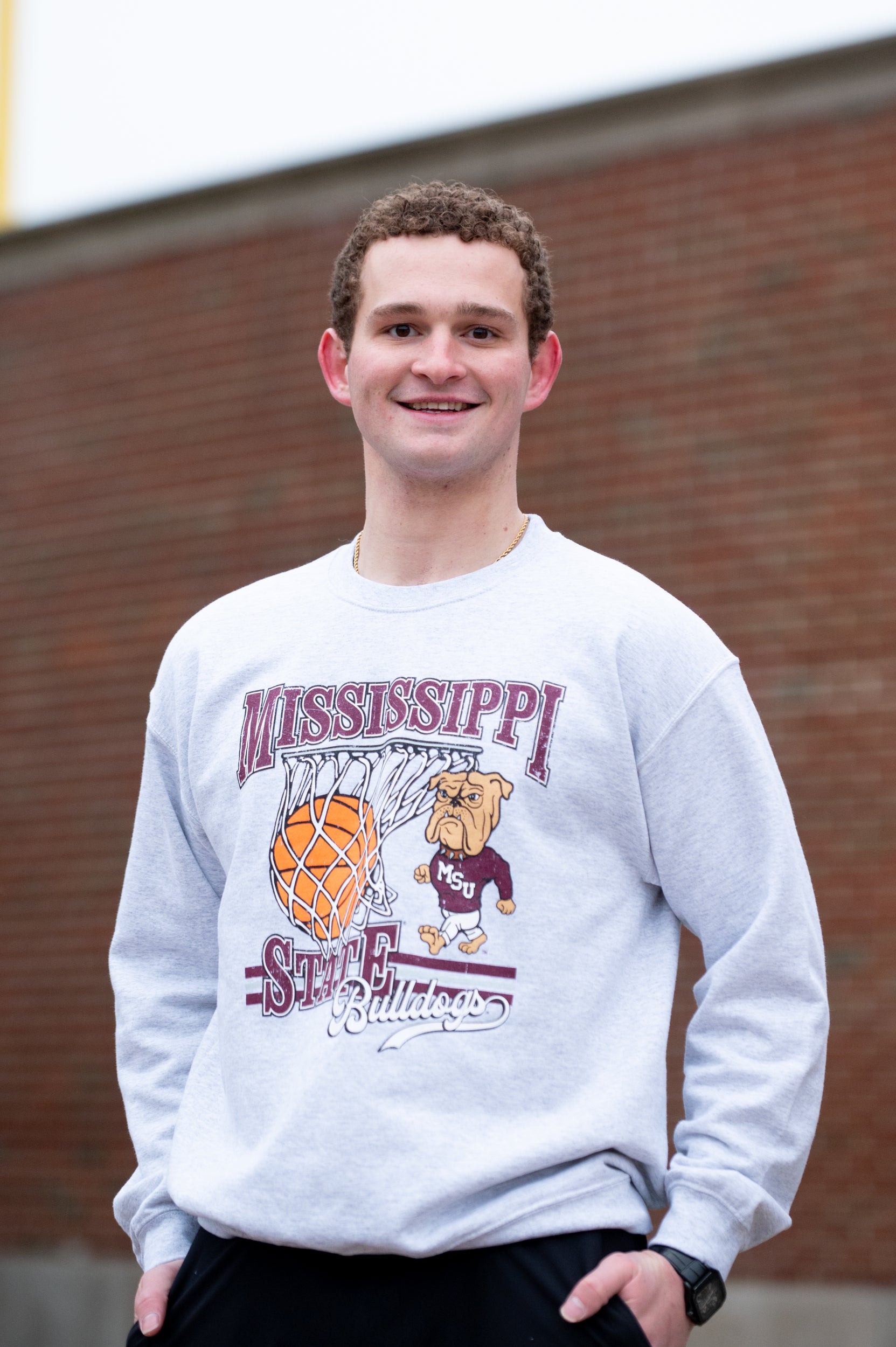 Mississippi State Light Grey Heather Sweatshirt with a basketball landing in a hoop between text “Mississippi” and “State” and next to Bully