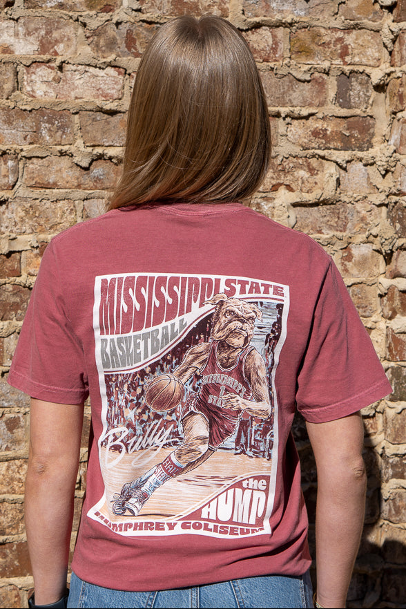 Mississippi State Crimson T-Shirt with a basketball card style design featuring Bully dribbling a basketball down the court in between text “Mississippi State Basketball” and “The Hump Humphrey Coliseum”
