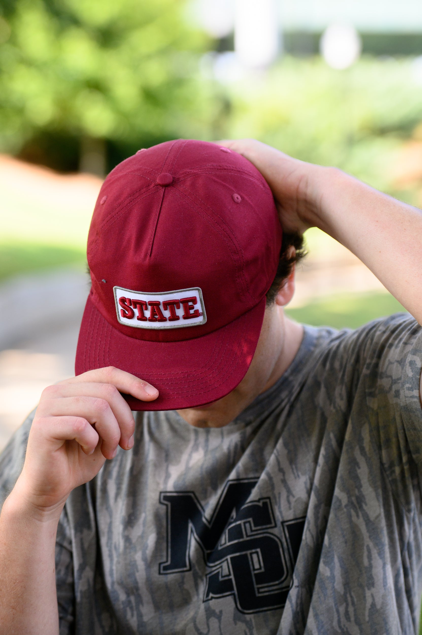 Mississippi State Maroon Snapback Hat featuring a White patch with Maroon “State” embroidery
