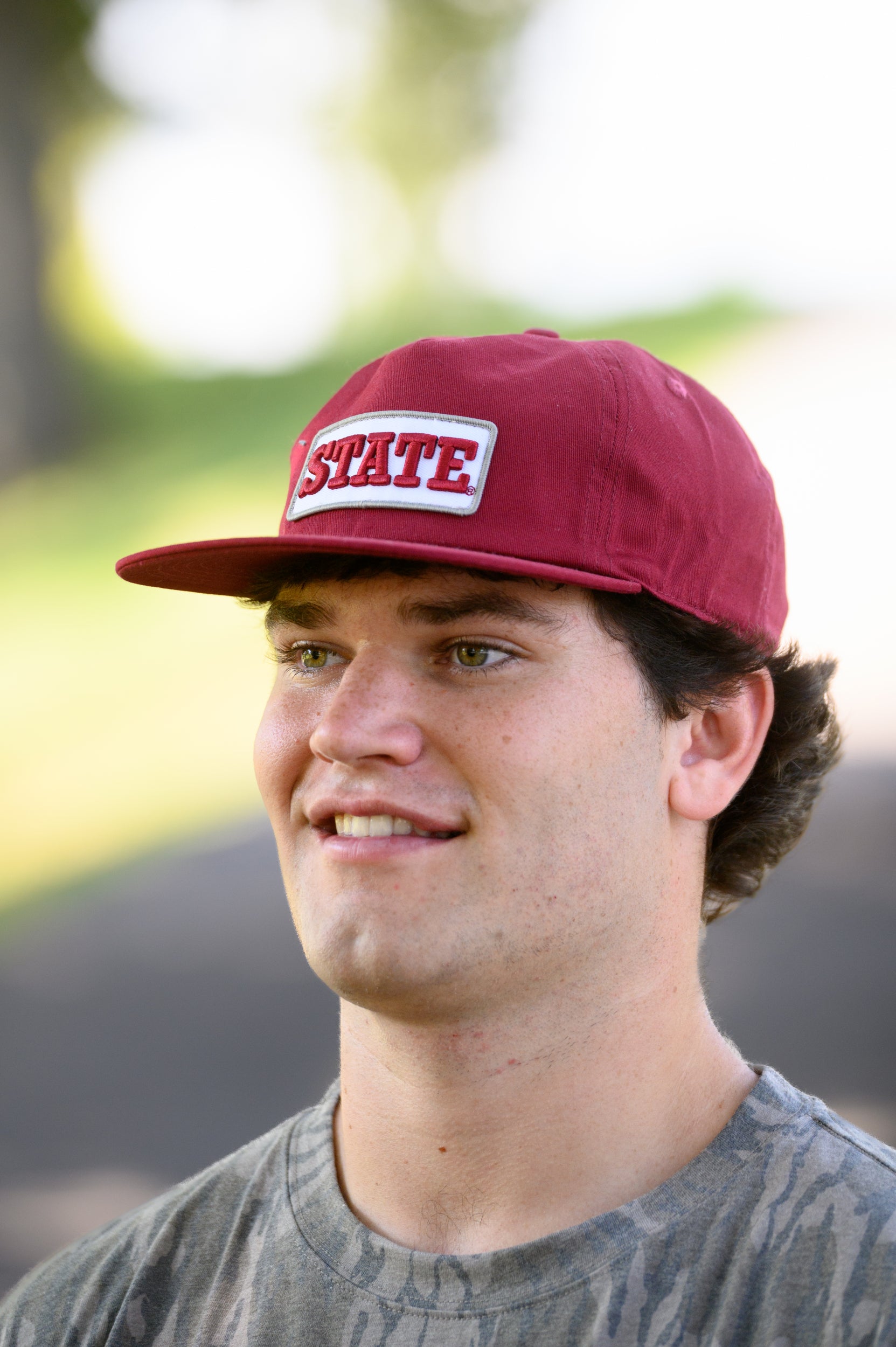 Mississippi State Maroon Snapback Hat featuring a White patch with Maroon “State” embroidery