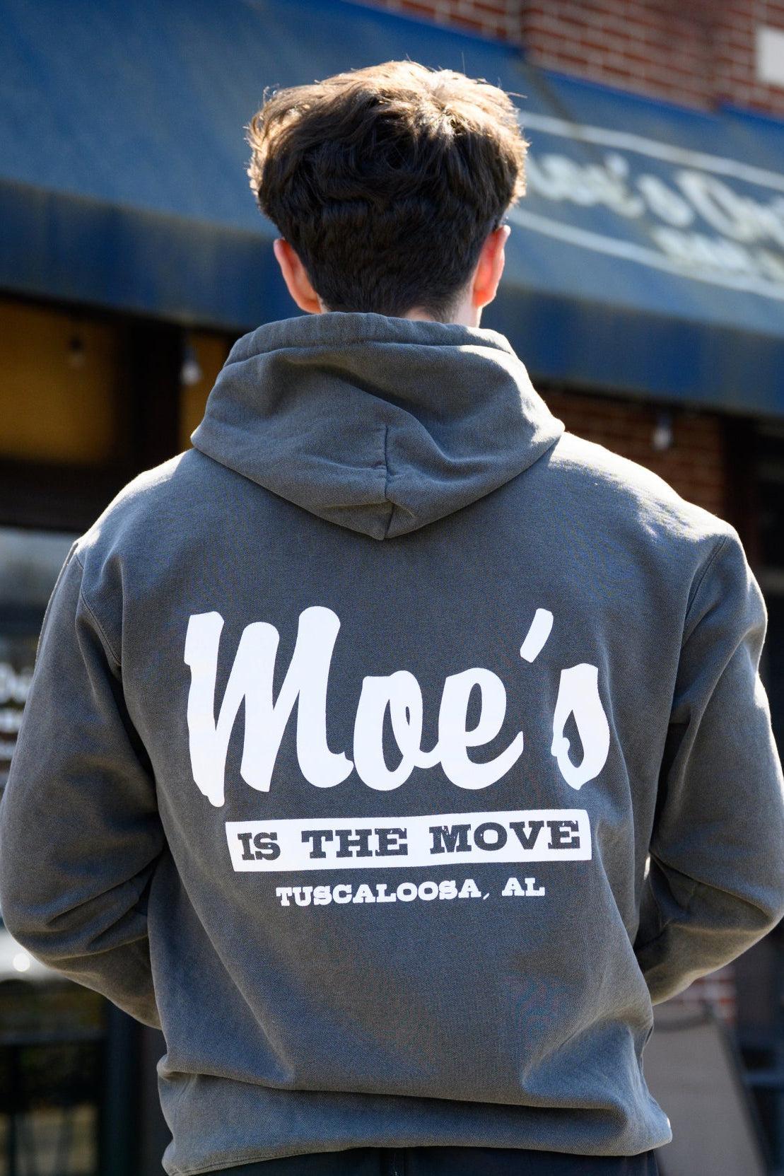 Moe's Dark Grey Hoodie with White text "Moe's” and Grey text in a White Block, “Is The Move" printed on the back