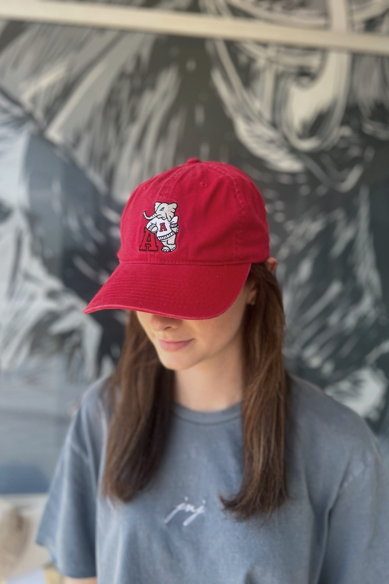 University of Alabama Red Dad Hat with an embroidered Big Al leaning on a Red Block A